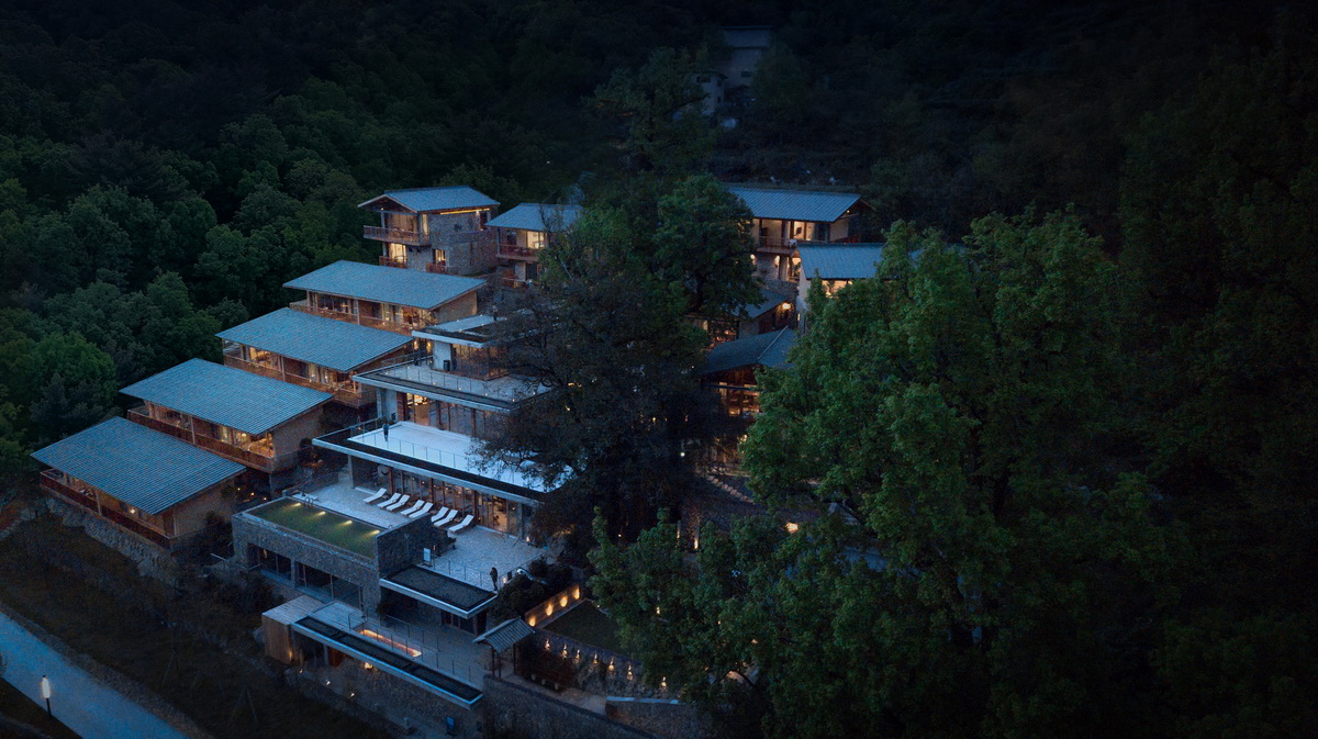 调整大小 13建筑体量层层展开，如从山中生长出来，the buildings are spread out layer by layer, resembling growing out of mountains.jpg